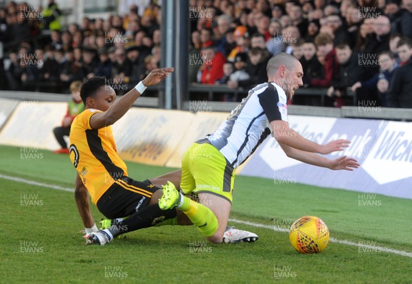170218 - Newport County v Notts County - Sky Bet League 2 -  Shawn McCoulsky of Newport County tackles Liam Noble of Notts County