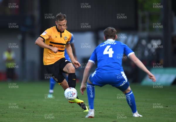 210818 - Newport County v Notts County - SkyBet League 2 - Mickey Demetriou of Newport County looks for a way past Elliott Hewitt of Notts County