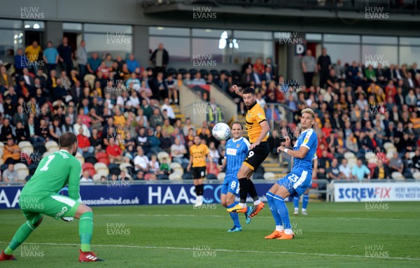 210818 - Newport County v Notts County - SkyBet League 2 - Padraig Amond of Newport County tries a shot at goal