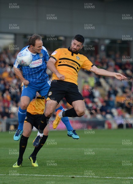 210818 - Newport County v Notts County - SkyBet League 2 - Padraig Amond of Newport County heads a shot at goal