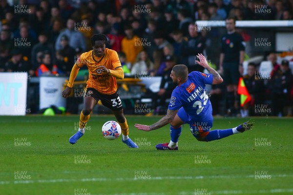 041123 - Newport County v Oldham Athletic - FA Cup First Round - Matty Bondswell of Newport County beats Kieron Freeman of Oldham Athletic
