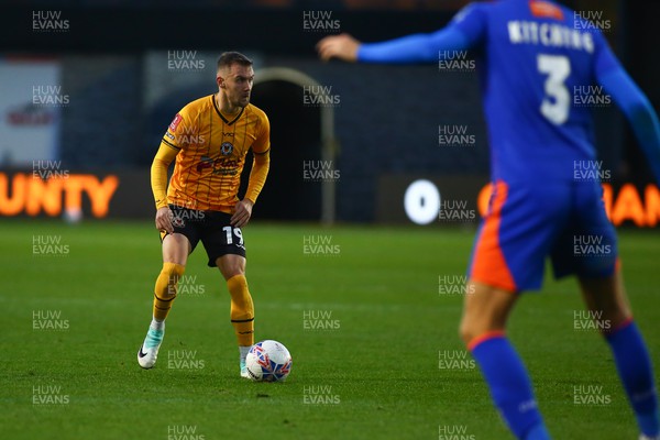 041123 - Newport County v Oldham Athletic - FA Cup First Round - Shane McLoughlin of Newport County lines up a shot at goal