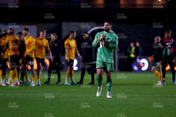 041123 - Newport County v Oldham Athletic - FA Cup First Round - Nick Townsend of Newport County applauds the fans as team mates celebrate at the end of the game