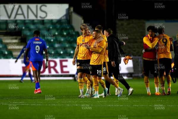 041123 - Newport County v Oldham Athletic - FA Cup First Round - Shane McLouoghlin of Newport County celebrates with Declan Drysdale at the end of the game
