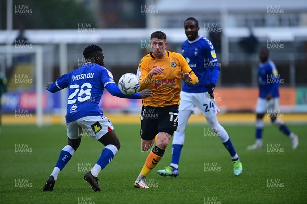 120222 - Newport County v Oldham Athletic - Sky Bet League 2 - Mickey Demetriou of Newport County battles with Scot Bennett of Newport County 