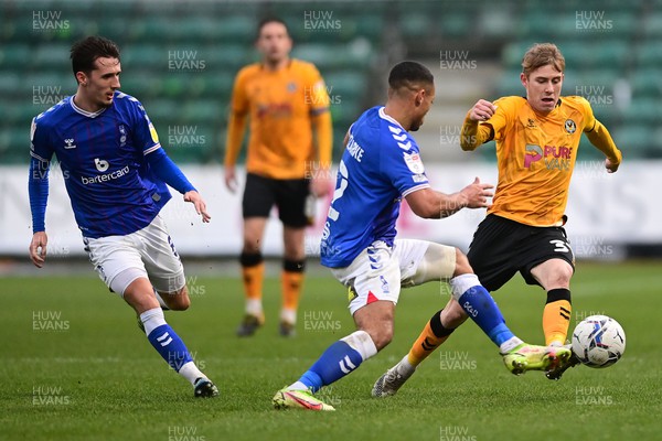 120222 - Newport County v Oldham Athletic - Sky Bet League 2 - Oli Cooper of Newport County under pressure from Jordan Clarke of Oldham Athletic 