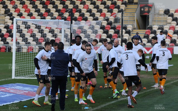 191220 - Newport County v Oldham Athletic, Sky Bet League 2 - Newport County players warm up wearing T-shirts showing support for former manager's Justin Edinburgh 3 Foundation