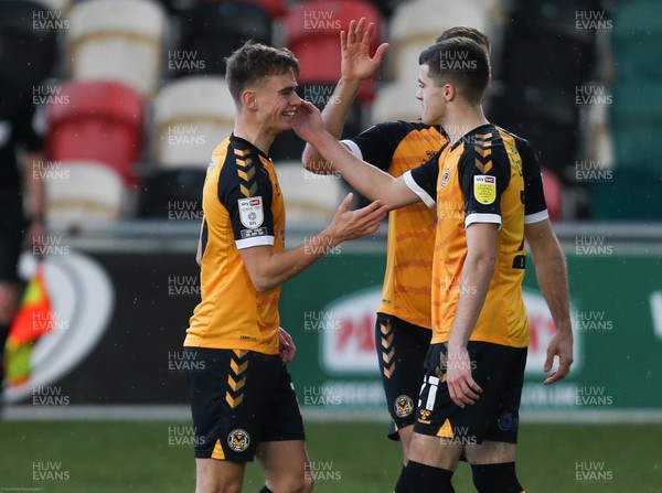 191220 - Newport County v Oldham Athletic, Sky Bet League 2 - Scott Twine of Newport County is congratulated by Mickey Demetriou of Newport County and Lewis Collins of Newport County after scoring goal