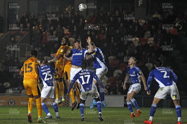 231119 - Newport County v Oldham Athletic, Sky Bet League 2 - Jamille Matt of Newport County (3rd left) heads the ball