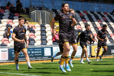 250426 - Newport County v Oldham Athletic - Sky Bet League 2 - Anthony Driscoll-Glennon of Newport County warming up before game 