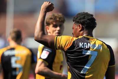 250426 - Newport County v Oldham Athletic - Sky Bet League 2 - Bobby Kamwa of Newport County celebrates after scoring