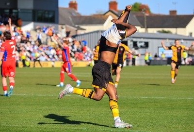 250426 - Newport County v Oldham Athletic - Sky Bet League 2 - Bobby Kamwa of Newport County celebrates after scoring in the 18th minute of injury time at the end of the match