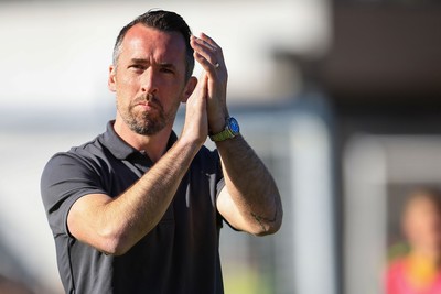 250426 - Newport County v Oldham Athletic - Sky Bet League 2 - Newport County Manager Christian Fuchs applauds fans after the game