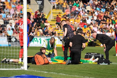 250426 - Newport County v Oldham Athletic - Sky Bet League 2 - Mathew Hudson of Oldham Athletic receives treatment for an injury