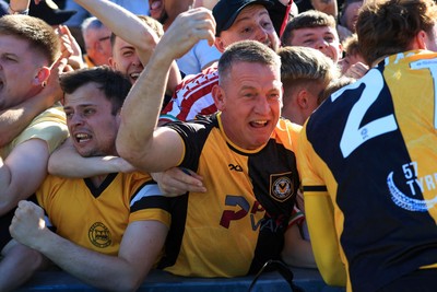 250426 - Newport County v Oldham Athletic - Sky Bet League 2 - Newport Fans celebrate 