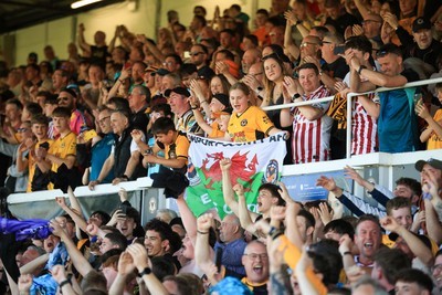 250426 - Newport County v Oldham Athletic - Sky Bet League 2 - Newport Fans celebrate 