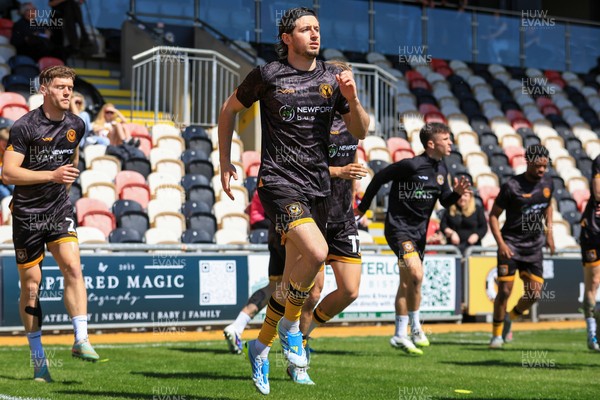 250426 - Newport County v Oldham Athletic - Sky Bet League 2 - Anthony Driscoll-Glennon of Newport County warming up before game