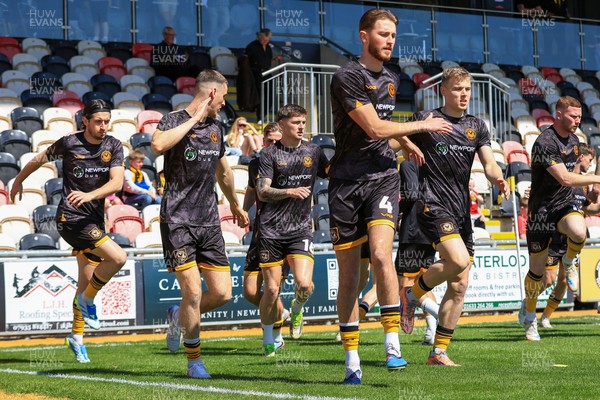 250426 - Newport County v Oldham Athletic - Sky Bet League 2 - Newport County players warming up before game