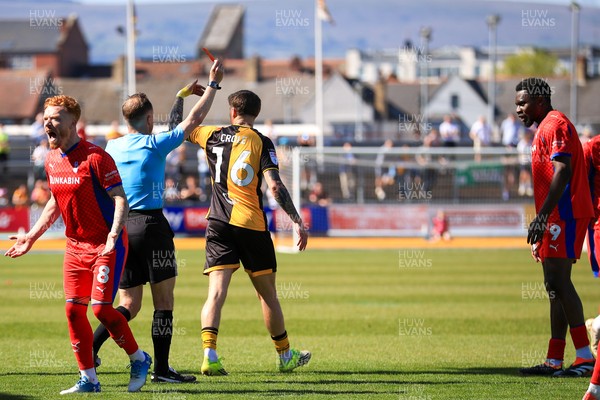 250426 - Newport County v Oldham Athletic - Sky Bet League 2 - Mike Fondop of Oldham Athletic Sent Off shown the red card by referee David Rock