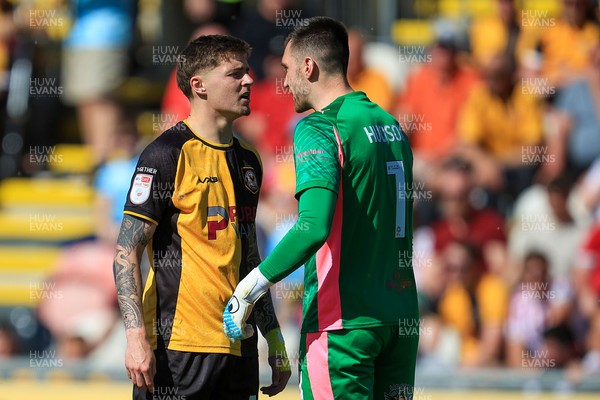 250426 - Newport County v Oldham Athletic - Sky Bet League 2 - James Crole of Newport County and Mathew Hudson of Oldham Athletic
