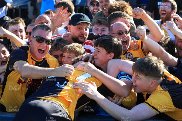 250426 - Newport County v Oldham Athletic - Sky Bet League 2 - Michael Spellman of Newport County celebrates with fans