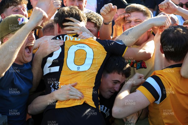 250426 - Newport County v Oldham Athletic - Sky Bet League 2 - Ben Lloyd of Newport County celebrates with fans