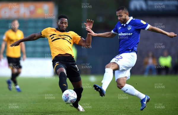 300419 - Newport County v Oldham Athletic - SkyBet League 2 - Jamille Matt of Newport County and Johan Branger of Oldham Athletic compete