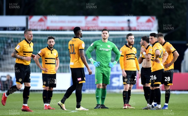 300419 - Newport County v Oldham Athletic - SkyBet League 2 - Joe Day of Newport County looks on with team mates