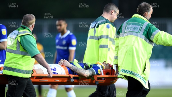 300419 - Newport County v Oldham Athletic - SkyBet League 2 - Peter Clarke of Oldham Athletic is stretchered off after injury
