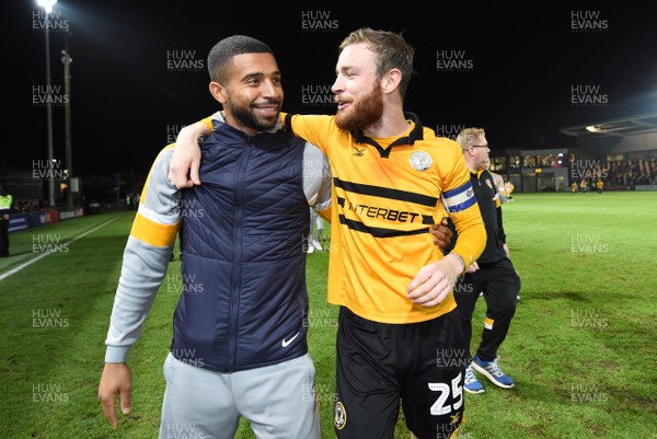 300419 - Newport County v Oldham Athletic - SkyBet League 2 - Joss Labadie and Mark O'Brien of Newport County at the end of the game