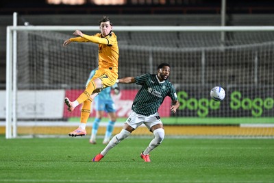061026 - Newport County v Plymouth Argyle - EFL Trophy - Alfie Merritt of Newport County is challenged by Tyreeq Bakinson of Plymouth