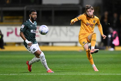 061026 - Newport County v Plymouth Argyle - EFL Trophy - Alfie Merritt of Newport County is challenged by Xavier Amaechi of Plymouth