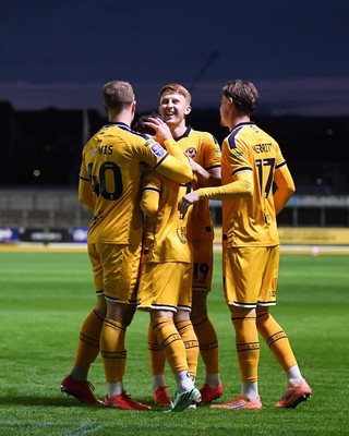 061026 - Newport County v Plymouth Argyle - EFL Trophy - Kieron Evans of Newport County celebrates scoring a goal with team mates