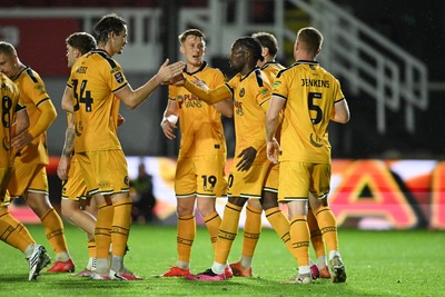 061026 - Newport County v Plymouth Argyle - EFL Trophy - Yahya Bamba of Newport County scores a goal from the penalty spot