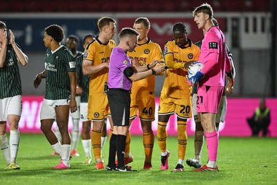 061026 - Newport County v Plymouth Argyle - EFL Trophy - Yahya Bamba of Newport County scores a goal from the penalty spot but is forced to retake it