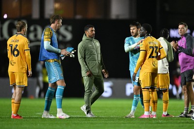 061026 - Newport County v Plymouth Argyle - EFL Trophy - Newport County Head Coach, Hayden Mullins and his players at full time