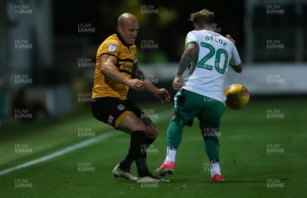 131118 - Newport County v Plymouth Argyle, EFL Checkatrade Trophy - David Pipe of Newport Countyis challenged by Gregg Wylde of Plymouth Argyle