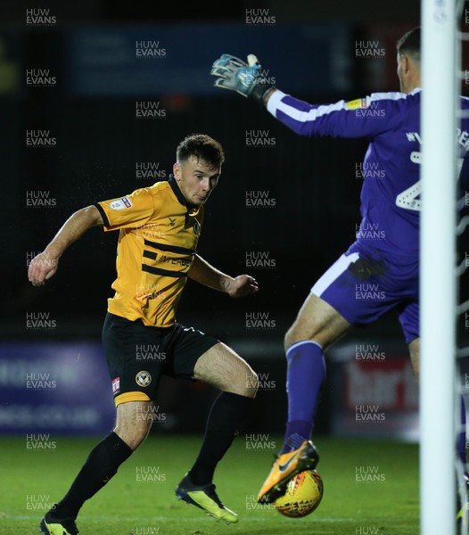131118 - Newport County v Plymouth Argyle, EFL Checkatrade Trophy - Mark Harris of Newport County heads past Plymouth goalkeeper Kyle Letheren to score County's second goal