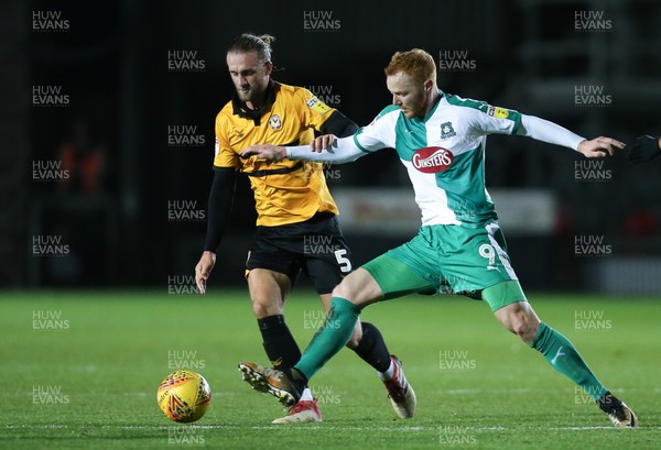 131118 - Newport County v Plymouth Argyle, EFL Checkatrade Trophy - Ryan Taylor of Plymouth Argyle and Fraser Franks of Newport County compete for the ball