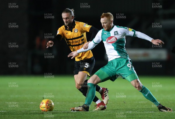 131118 - Newport County v Plymouth Argyle, EFL Checkatrade Trophy - Ryan Taylor of Plymouth Argyle and Fraser Franks of Newport County compete for the ball