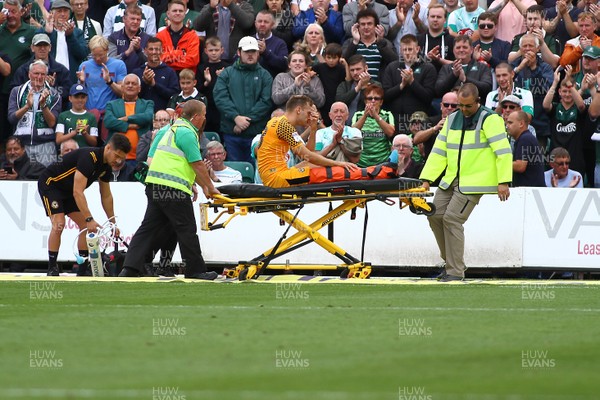 170819 Newport County vs Plymouth Argyle - Sky Bet League 2 - Mickey Demetriou of Newport County leaves the field on a stretcher