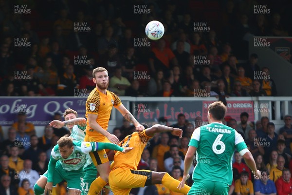 170819 Newport County vs Plymouth Argyle - Sky Bet League 2 - Mark O'Brien of Newport County jumps highest to win a header