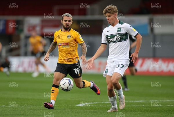 310821 - Newport County v Plymouth Argyle - Papa Johns Trophy - Dom Telford of Newport County is challenged by Brandon Pursall of Plymouth