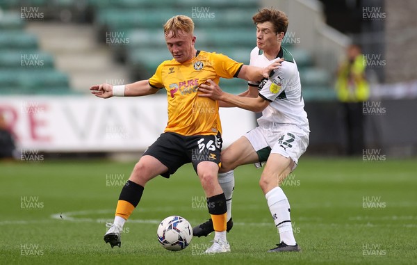 310821 - Newport County v Plymouth Argyle - Papa Johns Trophy - Aneurin Livermore of Newport County is challenged by Rhys Shirley of Plymouth