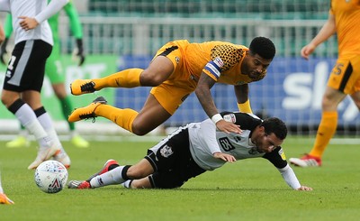 070919 - Newport County v Port Vale, SkyBet League 2 - Joss Labadie of Newport County and David Worrall of Port Vale collide as they compete for the ball