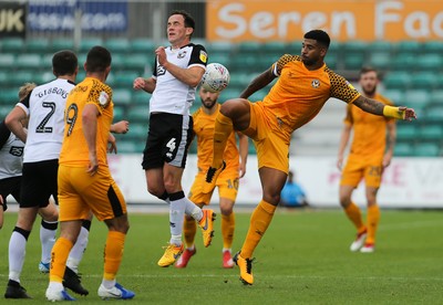 070919 - Newport County v Port Vale, SkyBet League 2 - Joss Labadie of Newport County and Luke Joyce of Port Vale compete for the ball