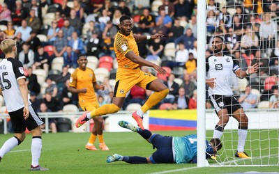 070919 - Newport County v Port Vale, SkyBet League 2 - Jamille Matt of Newport County beats Port Vale goalkeeper Scott Brown to score goal