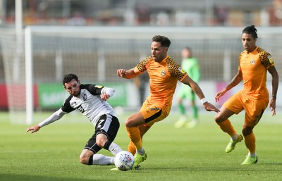 070919 - Newport County v Port Vale, SkyBet League 2 - Robbie Willmott of Newport County and David Worrall of Port Vale compete for the ball