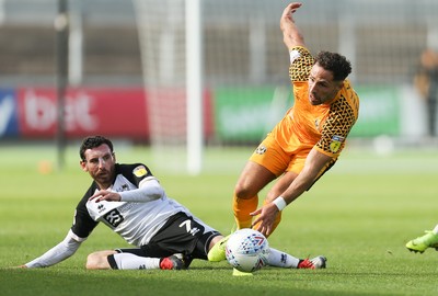070919 - Newport County v Port Vale, SkyBet League 2 - Robbie Willmott of Newport County and David Worrall of Port Vale compete for the ball