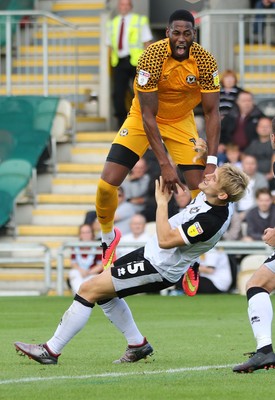 070919 - Newport County v Port Vale, SkyBet League 2 - Jamille Matt of Newport County collides with Nathan Smith of Port Vale as he is brought down and awarded a penalty